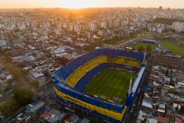 Aerial view of La Bombonera stadium in Buenos Aires, highlighting its unique shape and urban surroundings.