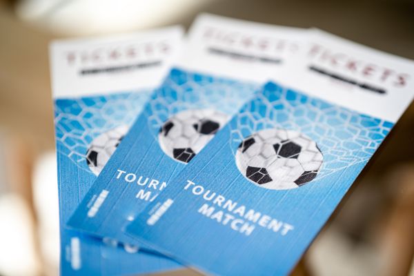 Blue match tickets with 'Tournament Match' written on them