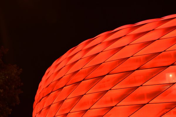 Allianz Arena exterior illuminated in red