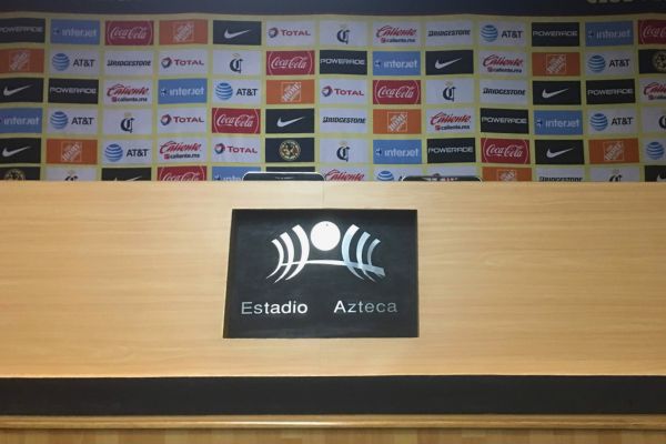 Press conference table at Estadio Azteca, set up for media events.