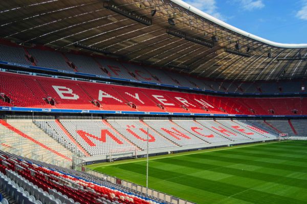 nterior view of Allianz Arena stadium with empty seats and no fans.