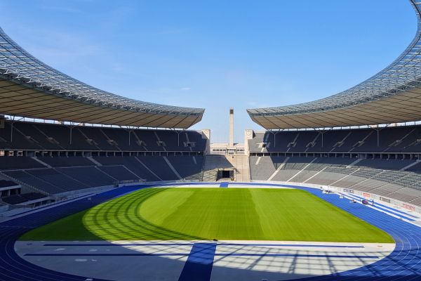 Interior view of Olympiastadion Berlin showcasing the grandstands and pitch.