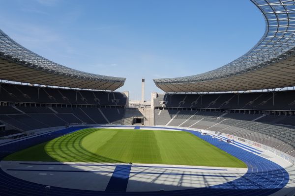 Interior view of Olympiastadion Berlin showcasing the grandstands and pitch.