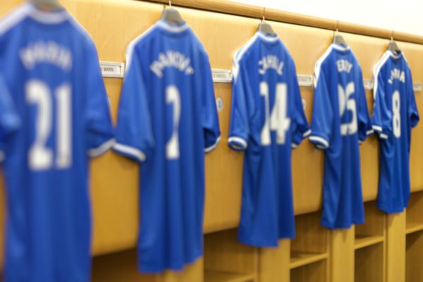 Chelsea shirts hanging in the home dressing room at Stamford Bridge.