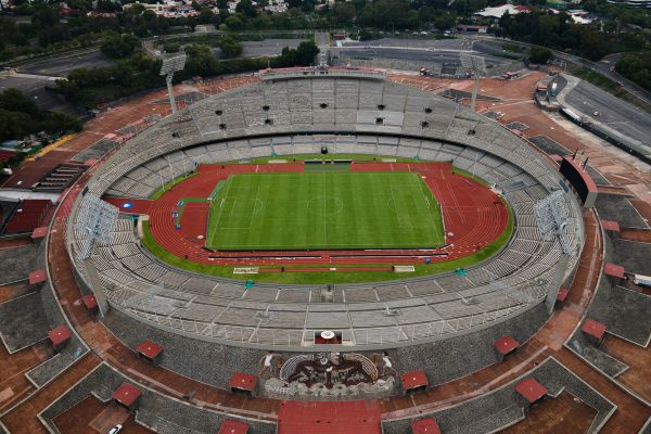 Aerial view of Estadio Olímpico Universitario, showcasing its iconic architecture and surrounding area.