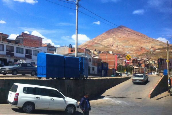 Cerro Rico towering over the city of Potosí, with its rugged landscape and historical mining heritage.