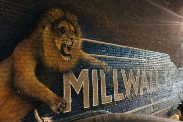 Mural of a lion painted on a wall near The Den, showcasing Millwall's iconic symbol.