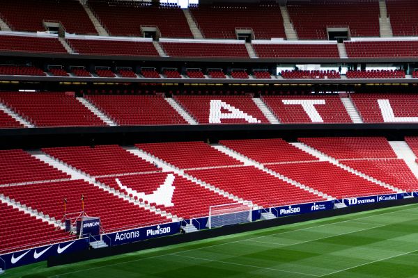 Red and white seats in the Metropolitano Stadium, home of Atletico Madrid.