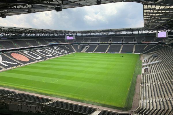 View of the empty seating and pitch inside MK Dons Stadium.