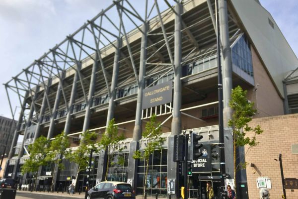 Outside view behind the Gallowgate Stand at St. James' Park, Newcastle, showing the stadium’s exterior structure.