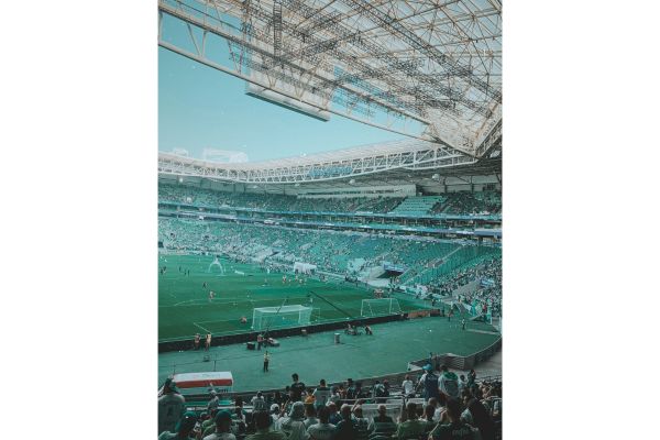 Interior view of Allianz Arena São Paulo before the match, with early-arriving Palmeiras fans filling the stands in anticipation.