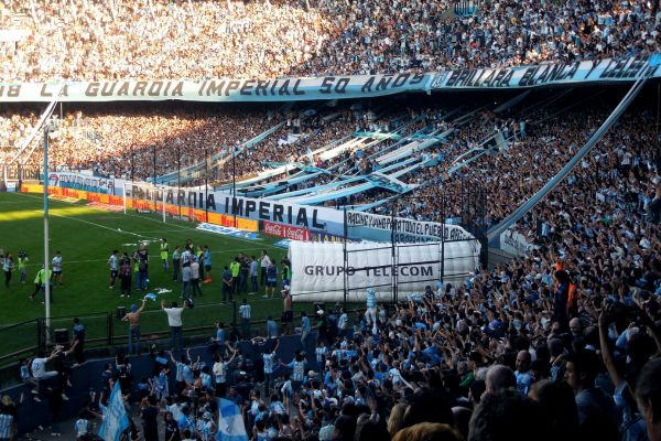 Packed stands at Estadio Presidente Perón during a Racing Club matchday with passionate fans.