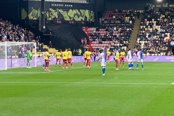 Watford players wearing red shorts in a match against Blackburn Rovers