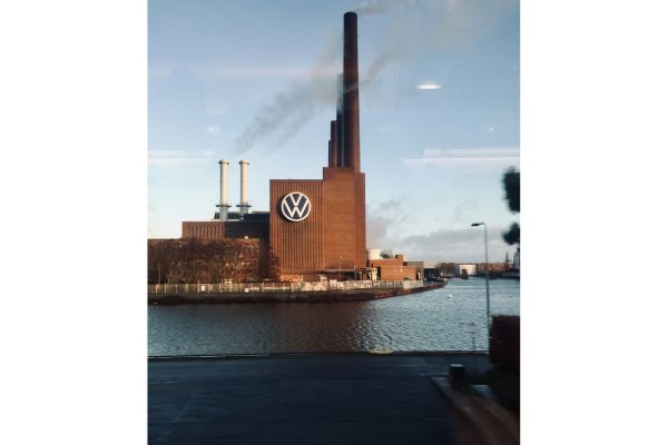 Aerial view of the Volkswagen factory in Wolfsburg, Germany, showcasing its iconic industrial design and sprawling facilities