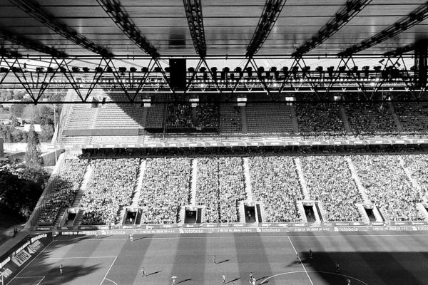 Black and white image of a packed stand at Braga Stadium on matchday.