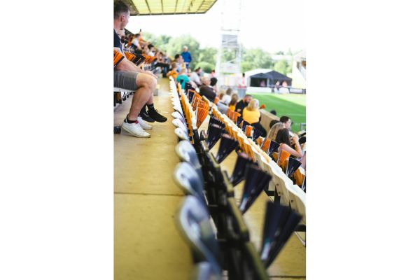 Empty rows of seats at Cledara Abbey Stadium.