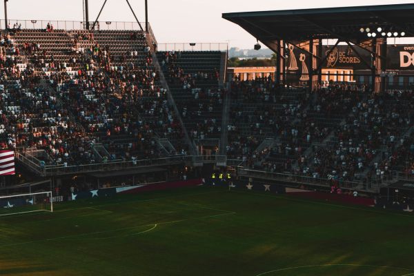 The vibrant stand at Audi Field filled with enthusiastic D.C. United fans during a matchday.