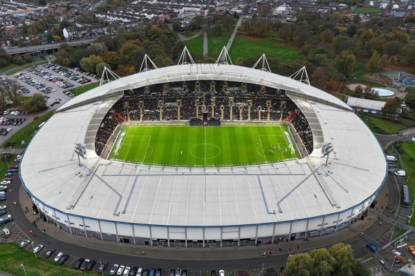 Aerial view of Hull City’s KCOM Stadium (now known as MKM Stadium), showcasing the iconic architecture and surrounding area. The stadium is home to Hull City AFC in East Yorkshire, England.