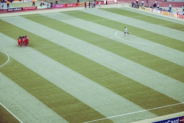 Max Morlock Stadion pitch during a live football match with players in action.