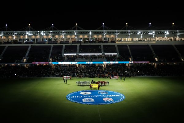 Orlando City Stadium at night with the pitch illuminated by spotlights.