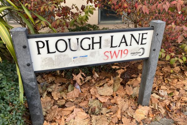 Road Sign of Plough Lane, London.