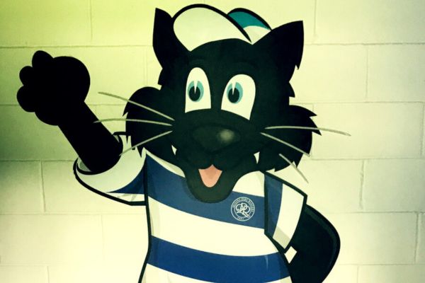 Mural of QPR mascot Jude the Cat painted on a wall at Loftus Road stadium, wearing the club’s blue and white hoops.