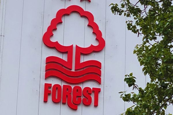 Nottingham Forest badge on side of the Trent End Stand at the City Ground Stadium.