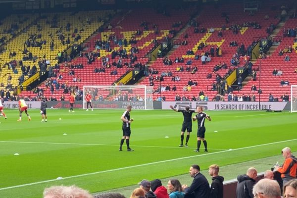 Match Officials Warming Up in Designated Area at Vicarage Road.