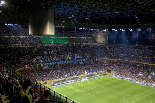 Evening match at the Stadio Giuseppe Meazza and/or Stadio San Siro.