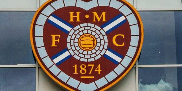 Image of Heart of Midlothian (Hearts) Football Club badge outside Tynecastle Stadium.